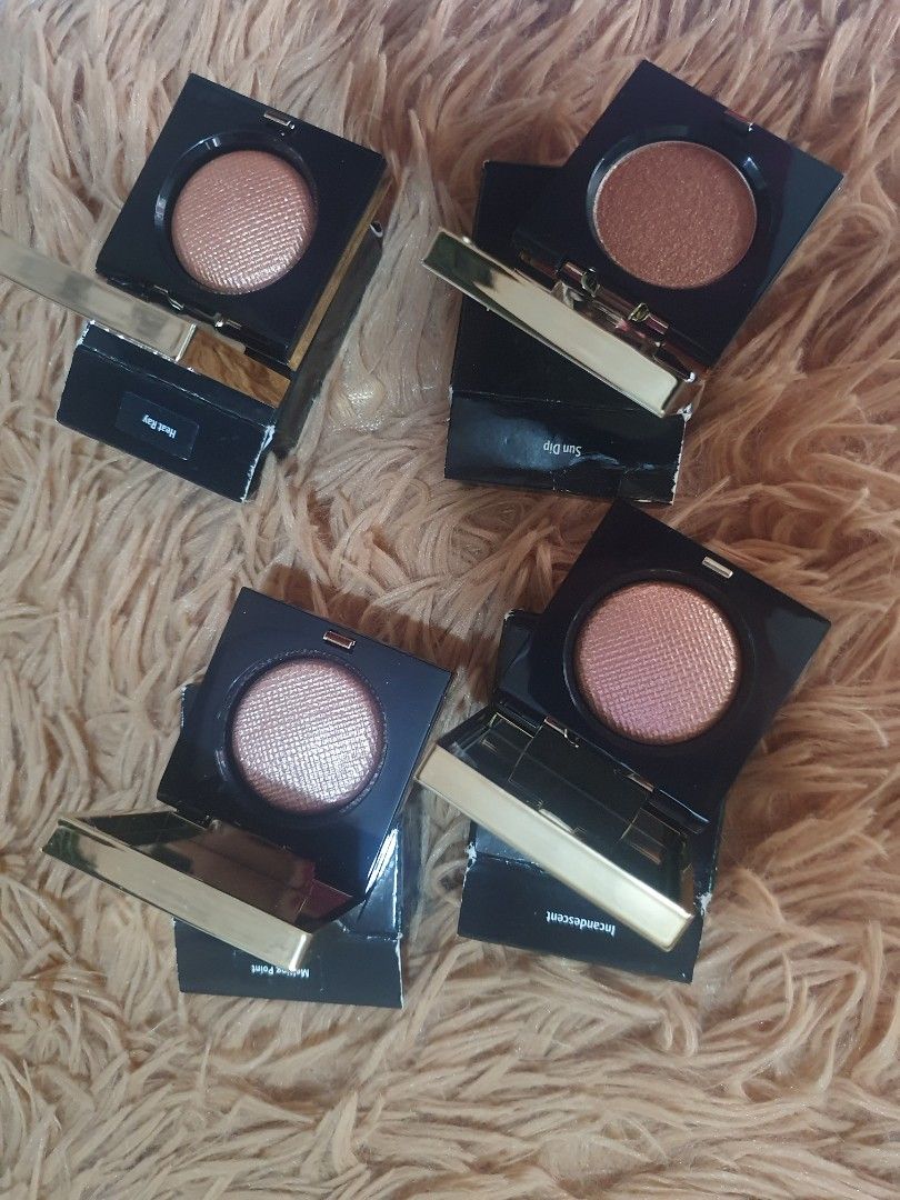Bobbi Brown Luxe Eye Shadow Rich Metal (Category: Makeup) located in Pugo. Submitted by abshopfinity (Listing ID 1404315716, Image 1). Description: Bobbi Brown Luxe Eye Shadow in Rich Metal. The eyeshadows are in individual compacts with a mirror. The packaging is black with gold accents. The eyeshadows appear to be a shimmery, metallic finish. Several shades are visible, including bronze and pink tones. Each compact has the Bobbi Brown logo. 1,1