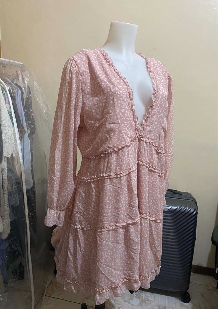 Casual dress Deep neck with ruffled open back (Category: Dresses) located in Rizal. Submitted by shoppables (Listing ID 1404233040, Image 3). Description: Rue 21 pink ditsy floral print tiered ruffle mini dress with a deep V-neck and long sleeves. With a ruffled open back and tiered skirt..