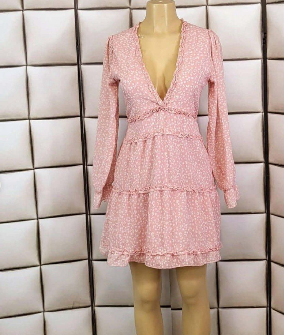 Casual dress Deep neck with ruffled open back (Category: Dresses) located in Rizal. Submitted by shoppables (Listing ID 1404233040, Image 2). Description: Rue 21 pink ditsy floral print tiered ruffle mini dress with a deep V-neck and long sleeves. With a ruffled open back and tiered skirt..