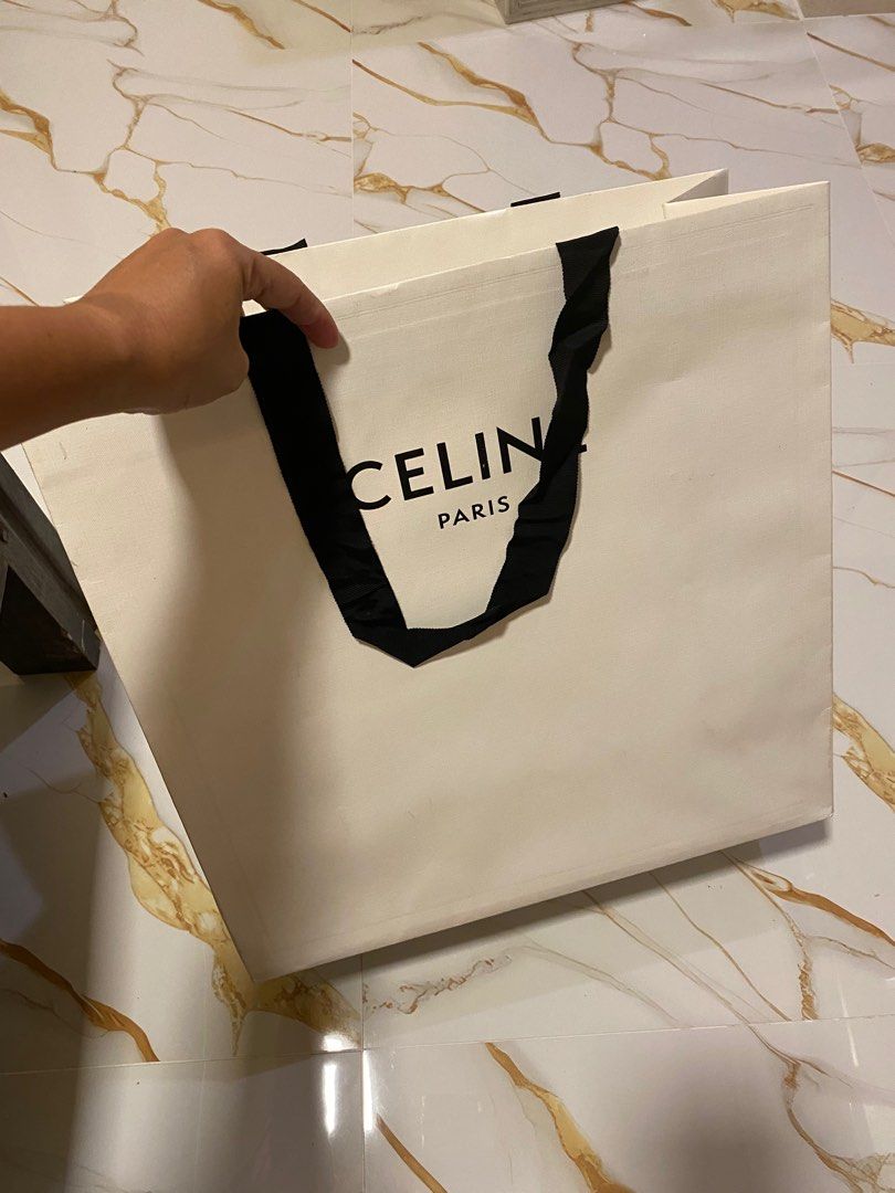 Celine Paris Paper Bag (Category: Luxury Bags & Wallets) located in Manila. Submitted by suavecompany (Listing ID 1404314376, Image 1). Description: Authentic Celine paper bag, makapal po and big size kasya ang isang shoe box ng sneakers.