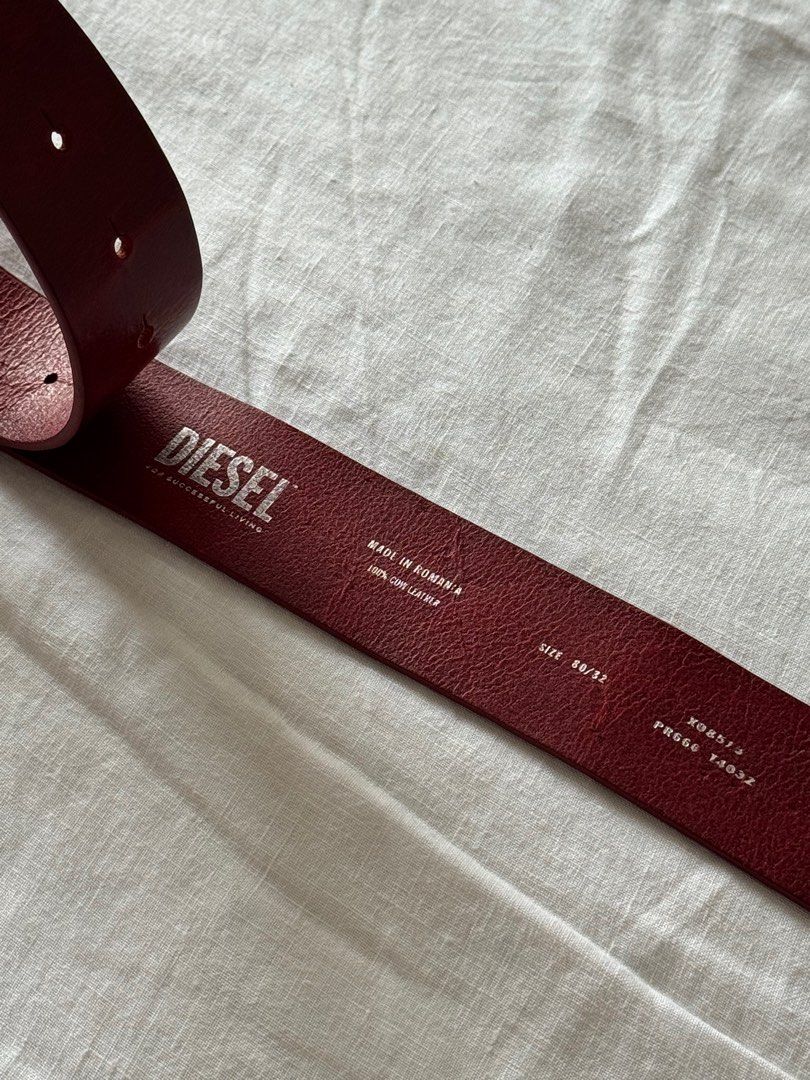 Diesel Leather Belt in Maroon (Category: Belts) located in Quezon City. Submitted by quietarchive (Listing ID 1404262456, Image 2). Description: Last price posted ♥︎Description: Bought for 10,800php in Tokyo last 2023 ♥︎Condition: 10/10 only wore a few times, has a vintage worn look ♥︎Material: -100% cow leather -Stainless steal hardware ♥︎Size: 80cm leather belt ♥︎Inclusions: dust bag .