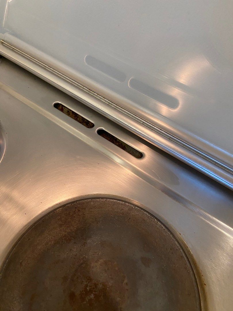 Electrolux range and hood (Category: Ovens & Toasters) located in Paranaque City. Submitted by pb.closet (Listing ID 1404198104, Image 3). Description: Electrolux range and oven. Features a fan and interior light. Includes a control panel with various settings. The oven door has a glass panel for easy viewing. The exterior is stainless steel. 90cm wide. Sold as a set with the range hood .