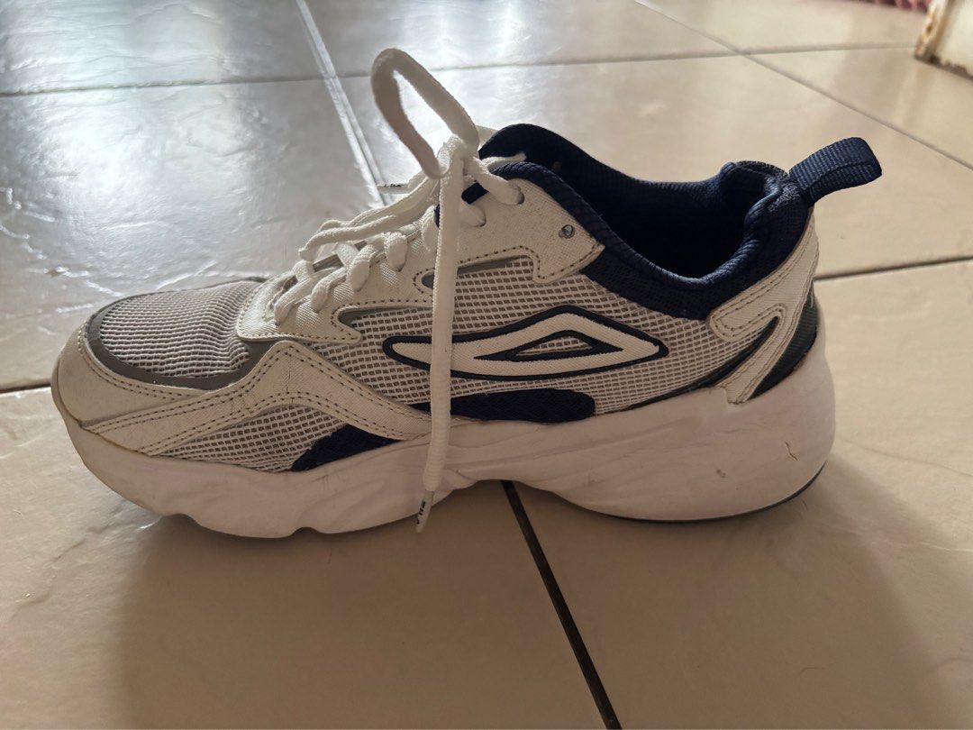 Fila Sneakers White Navy Size 7W (Category: Sneakers) located in Dasmarinas. Submitted by preloved.frommary (Listing ID 1404211906, Image 3). Description: - White and navy Fila sneakers - Mesh upper - White laces - Navy blue collar and pull tab.