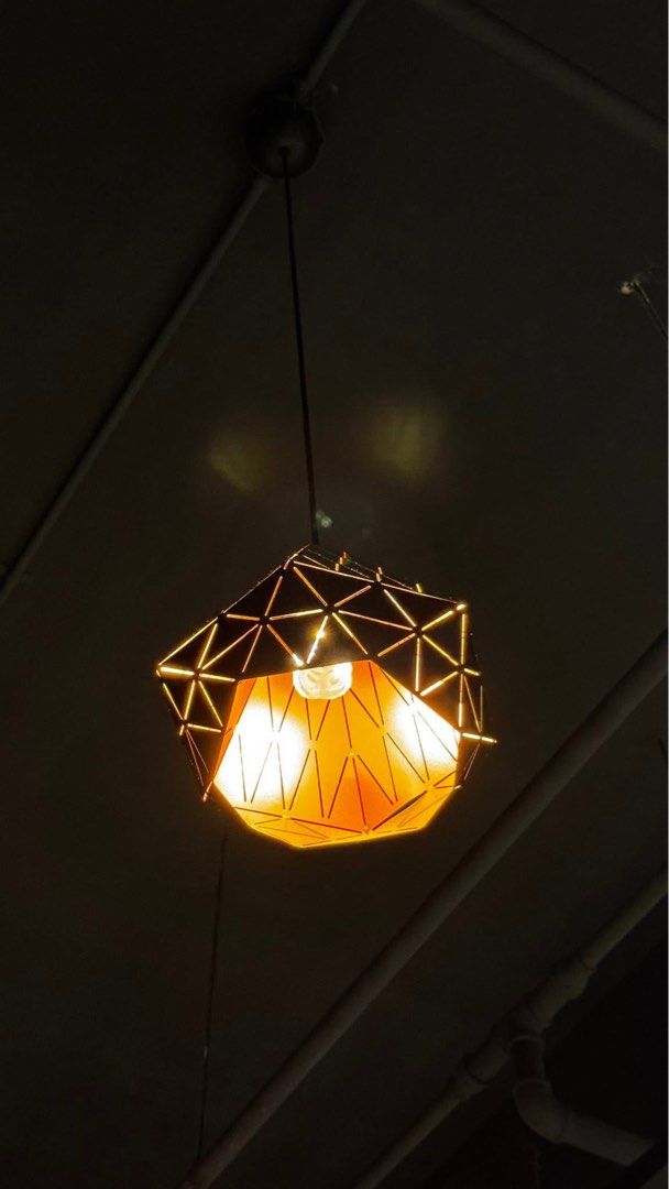 Geometric Diamond Metal Pendant Light Lamp (Category: Lighting) located in Antipolo. Submitted by thriftmanilaxx (Listing ID 1404224910, Image 2). Description: FOR SALE: DIAMOND SHAPE PENDANT LIGHTS - Modern industrial/geometrical shape metal frame design - Charcoal black exterior color and chrome interior color - With single-bulb, warm-white LED light ✴️ Item is in very good condition like new from office/studio pull-out. ✴️ 4pcs available 📍Pic