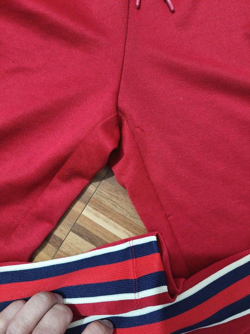 Gucci Red Track Pants (Category: Joggers) located in Taytay. Submitted by Rakeeeem (Listing ID 1404245969, Image 2). Description: For sale Gucci track pants Good condition Issue check pics, untag. 400 open for shipping, lalamove, cop thru lbc.