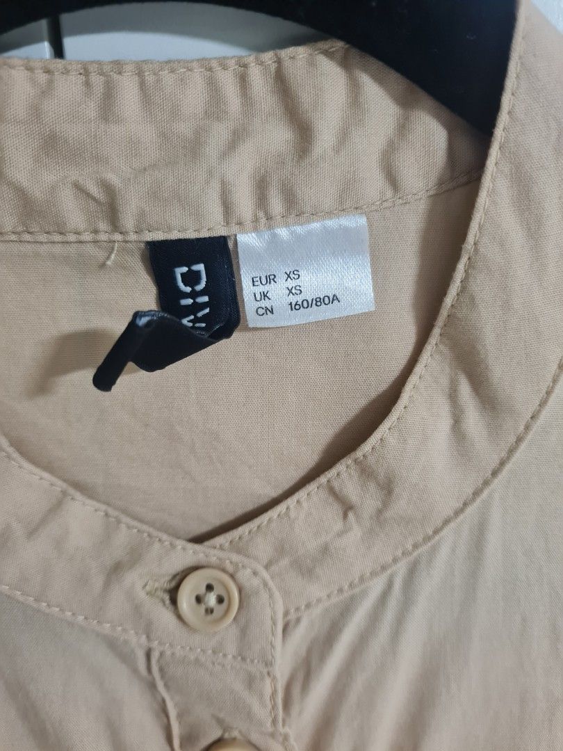 H&M dress (Category: Dresses) located in Las Pinas. Submitted by thegentlethread (Listing ID 1404178364, Image 2). Description: used once size xs on tag khaki brown 34" long 12" shoulder 17" sleeves fix price gcash or bpi online only jnt shipping fee 65 metromnila.