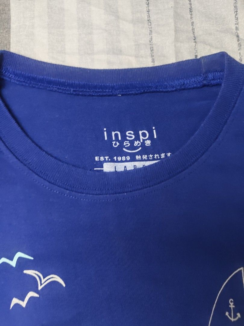 Inspi Mens T-Shirt - Large (Category: Tshirts & Polo Shirts ) located in Makati City. Submitted by tekhowz (Listing ID 1404199037, Image 2). Description: Inspi men's t-shirt features a nautical design with sailboats and waves. The shirt is a vibrant blue color. width - 22 inches length - 26.5 inches .