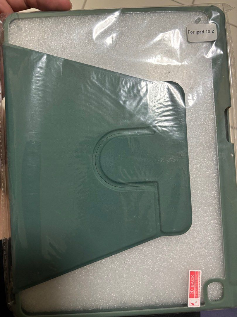 iPad casing (Category: Cases & Sleeves) located in Singapore. Submitted by then_hr2 (Listing ID 1404319706, Image 2). Description: Rarely used iPad case. Fast deal. Can set up and turn.