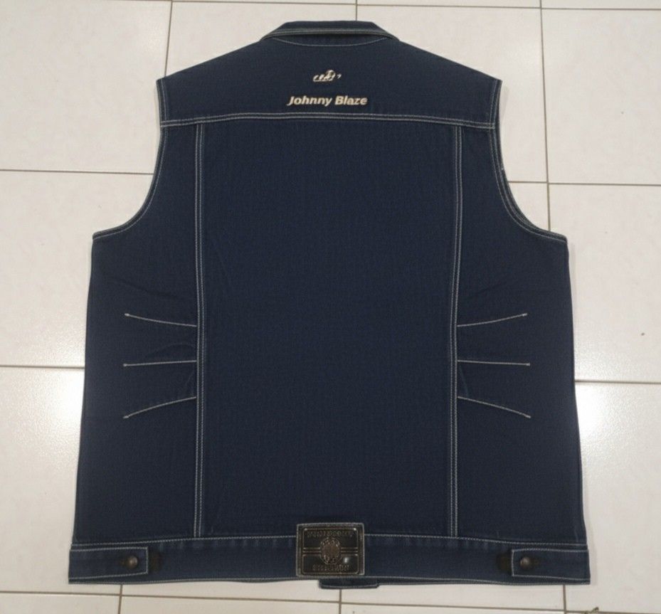 Johnny Blaze Denim Vest XL (Category: Vests) located in Baguio. Submitted by luxeloom099 (Listing ID 1404266154, Image 2). Description: -vintage Johnny Blaze denim vest - Size: XL - Color: Dark blue - Features embroidered "Johnny Blaze" logo - Material: 100% cotton - Classic button-up design - Two chest pockets.