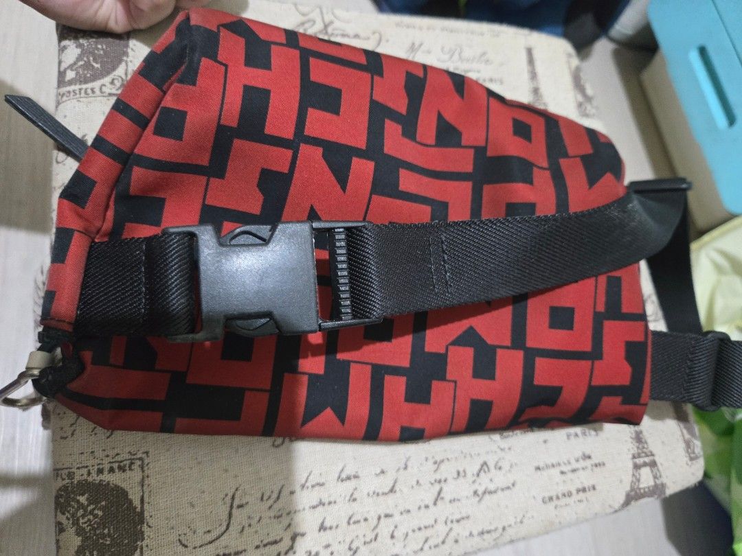 Longchamp Waist Bag Red and Black (Category: Luxury Bags & Wallets) located in Manila. Submitted by artefinds_ph (Listing ID 1404352880, Image 2). Description: - Longchamp waist bag - Color: Red and Black - Main compartment - Multiple card slots - Zippered pocket - Adjustable black strap - Buckle closure - Longchamp logo on front - Red interior lining.