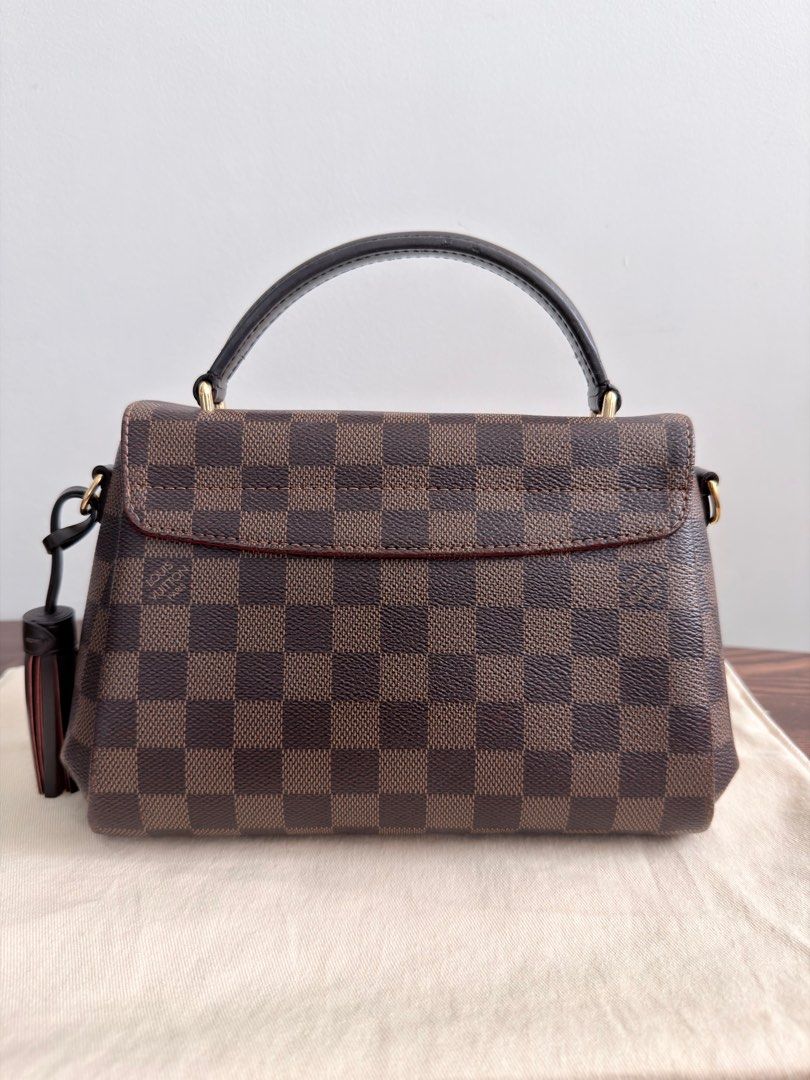 LV Croisette Damier Ebene Handbag (Category: Luxury Bags & Wallets) located in Manila. Submitted by solar_madness (Listing ID 1404354828, Image 2). Description: Louis Vuitton Croisette – Damier Ebene Condition: Excellent 9/10 • Minimal to Normal signs of use • No corner rub marks • Clean interior • Few hairline scratches on hardware Date Code: FL0280 Bought in LV Greenbelt Inclusions: • Detachable strap • Tassel • Dust bag • Box Beautiful LV Croi
