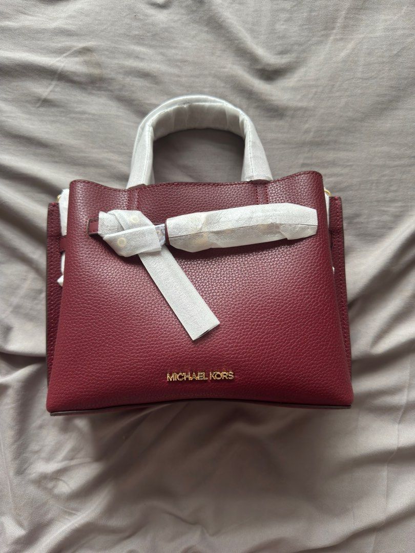 Michael Kors Mercer Small Top Handle Bag (Category: Luxury Bags & Wallets) located in Taguig. Submitted by mccdt (Listing ID 1404197881, Image 1). Description: - Michael Kors Mercer Small Top Handle Bag - Rich burgundy color - New and unused condition - Top handle and detachable strap - Zip closure - Interior pocket - Includes tag.