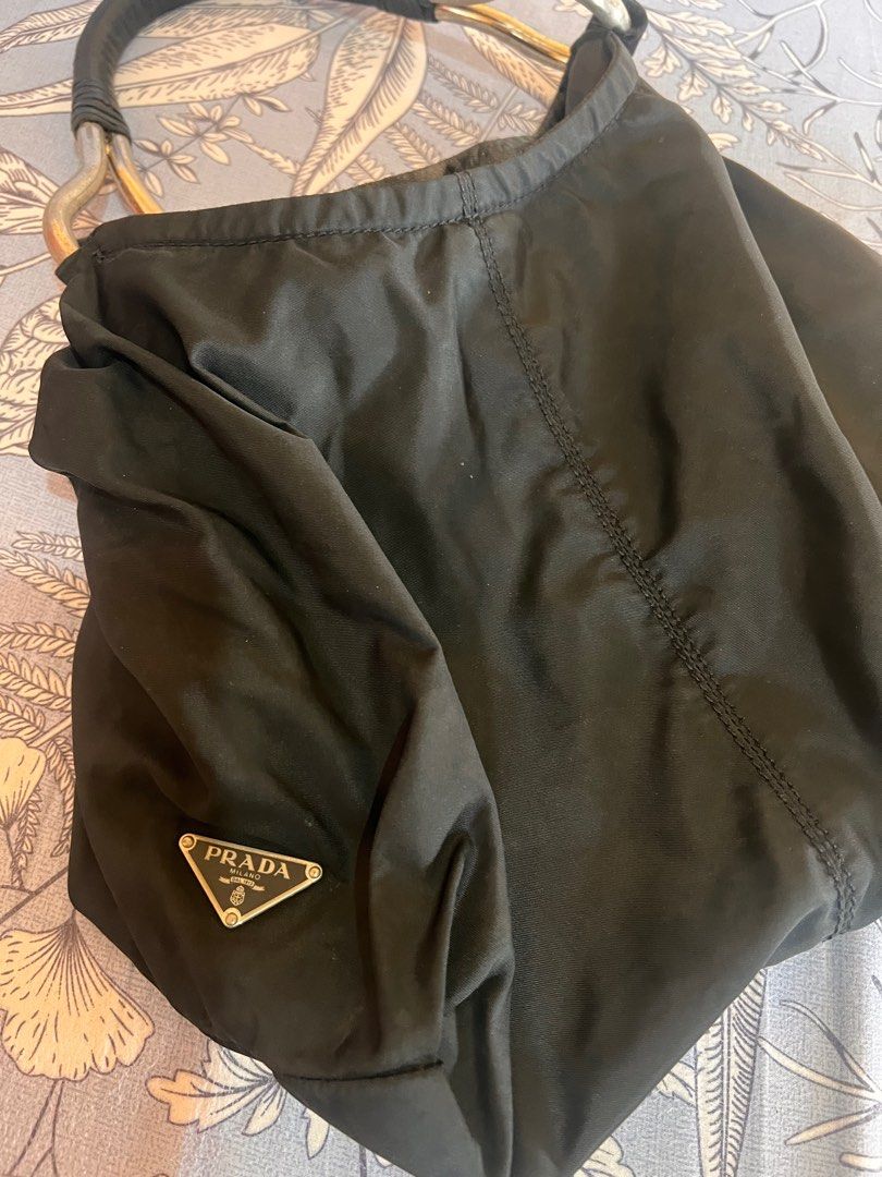 Prada Hobo Bag (Category: Luxury Bags & Wallets) located in Manila. Submitted by beatep (Listing ID 1404262733, Image 1). Description: Prada hobo bag Black nylon tessuto See actual pics for details Shipping ti be shouldered by the buyer.