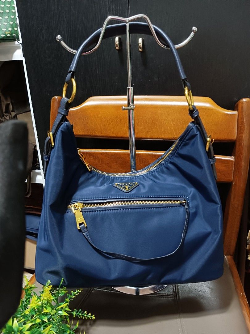 Prada Hobo Bag - Navy Blue (Category: Luxury Bags & Wallets) located in Digos. Submitted by chihanu (Listing ID 1404226915, Image 2). Description: it can wear as shoulder bag and crossbody as well...very spacious inside❤️❤️.