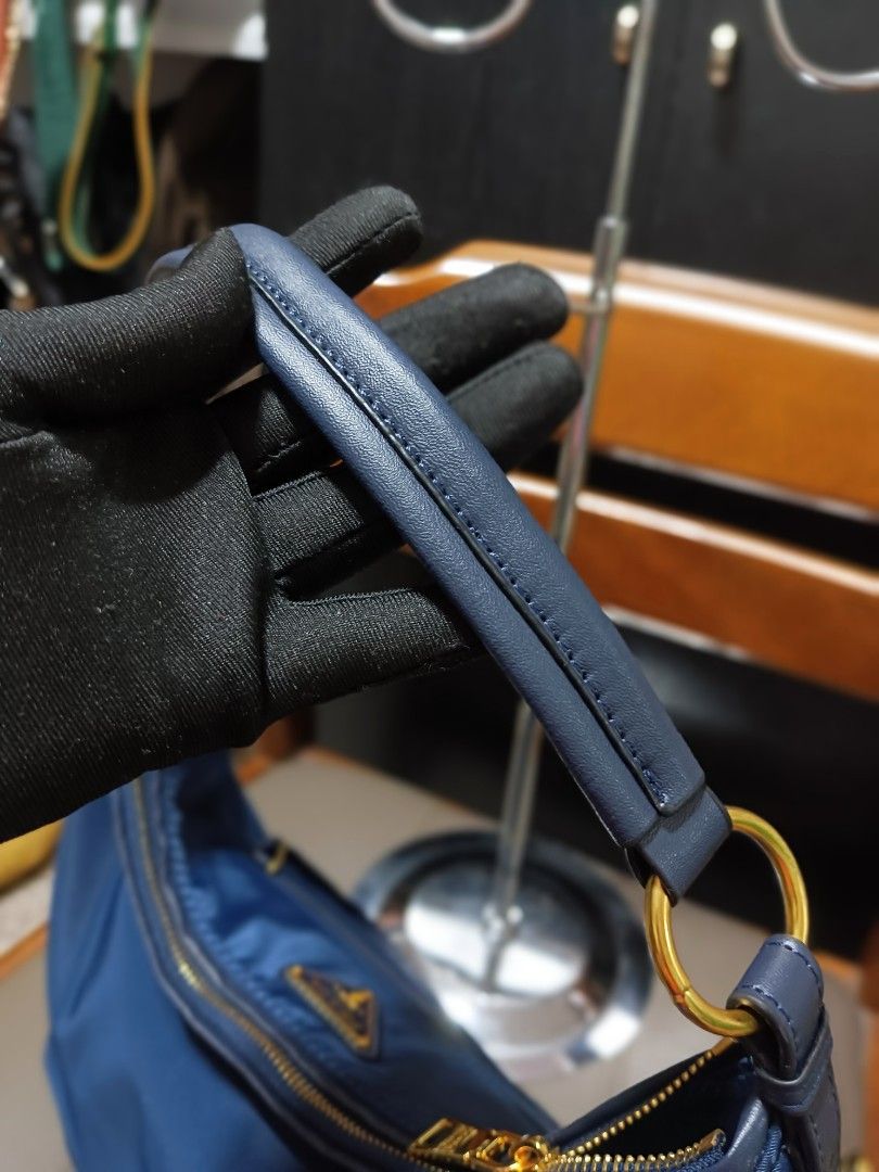 Prada Hobo Bag - Navy Blue (Category: Luxury Bags & Wallets) located in Digos. Submitted by chihanu (Listing ID 1404226915, Image 3). Description: it can wear as shoulder bag and crossbody as well...very spacious inside❤️❤️.