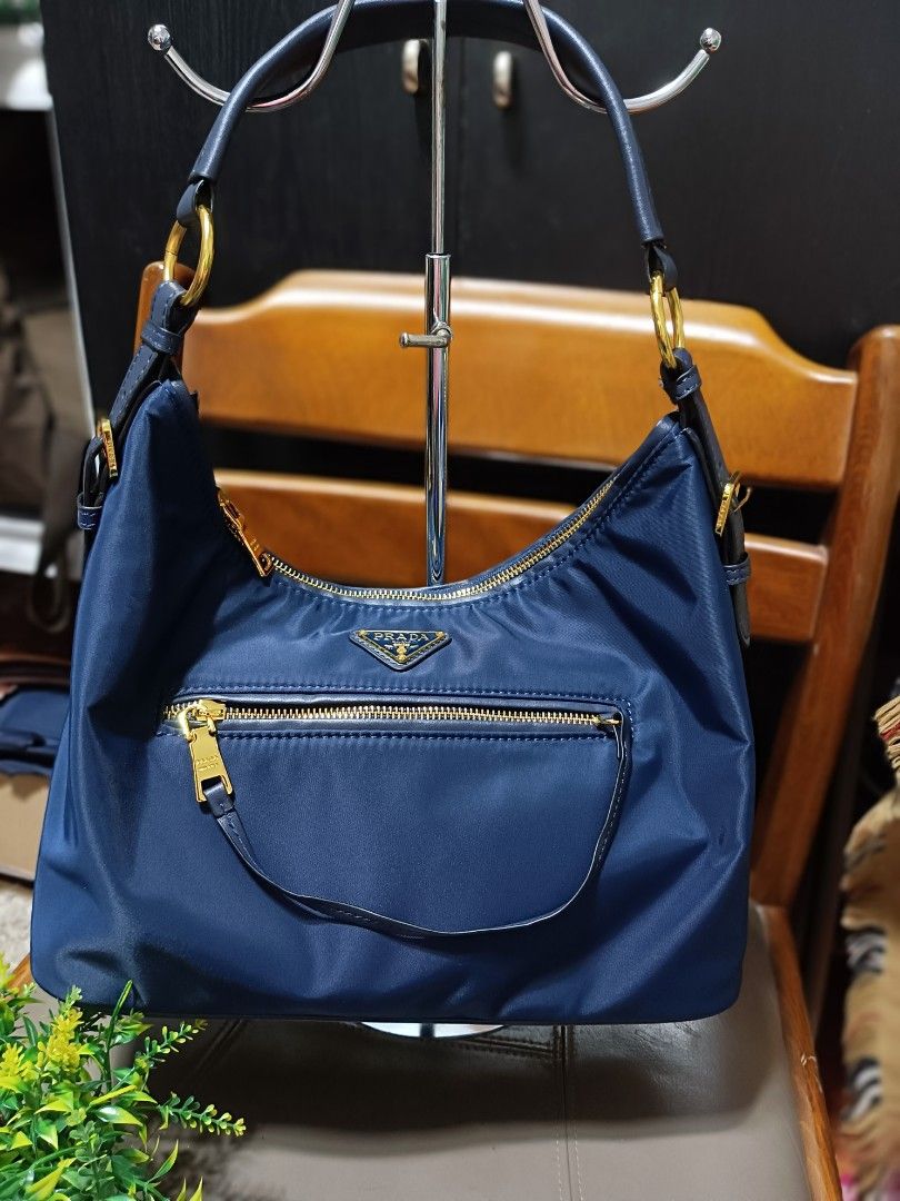 Prada Hobo Bag - Navy Blue (Category: Luxury Bags & Wallets) located in Digos. Submitted by chihanu (Listing ID 1404226915, Image 1). Description: it can wear as shoulder bag and crossbody as well...very spacious inside❤️❤️.