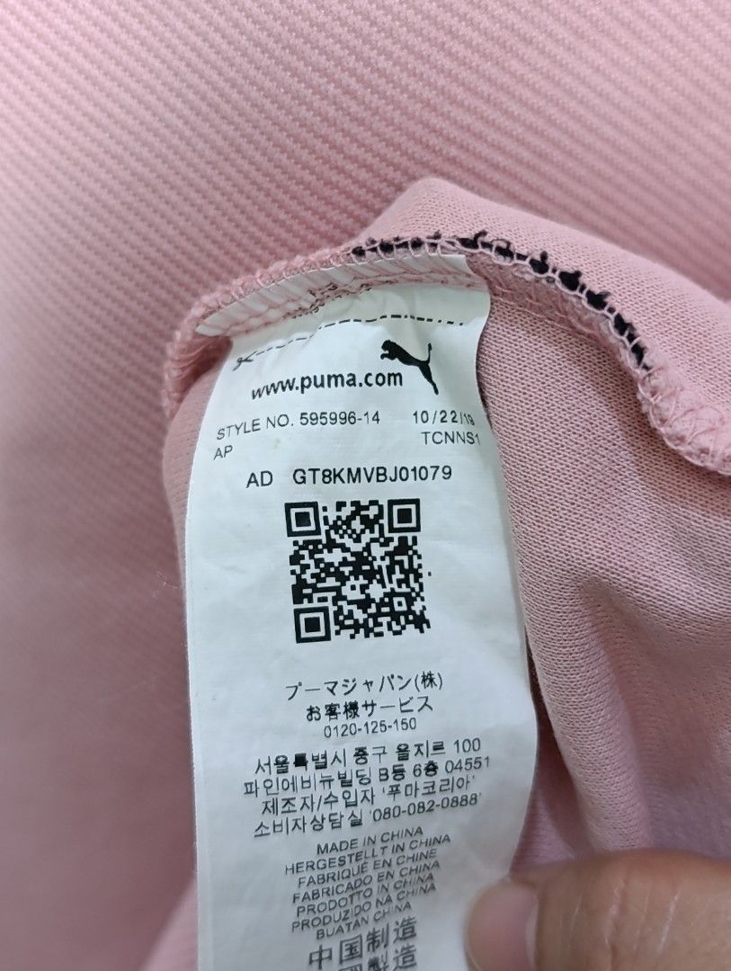 Puma Pink T-shirt - Size S (Category: Dresses) located in Manila. Submitted by avicmbe (Listing ID 1404231693, Image 3). Description: Pink Puma T-shirt. Features a small Puma logo on the chest and a Puma tag on the side. The shirt has a crew neck and short sleeves. The size is S (Asia). Made in China..
