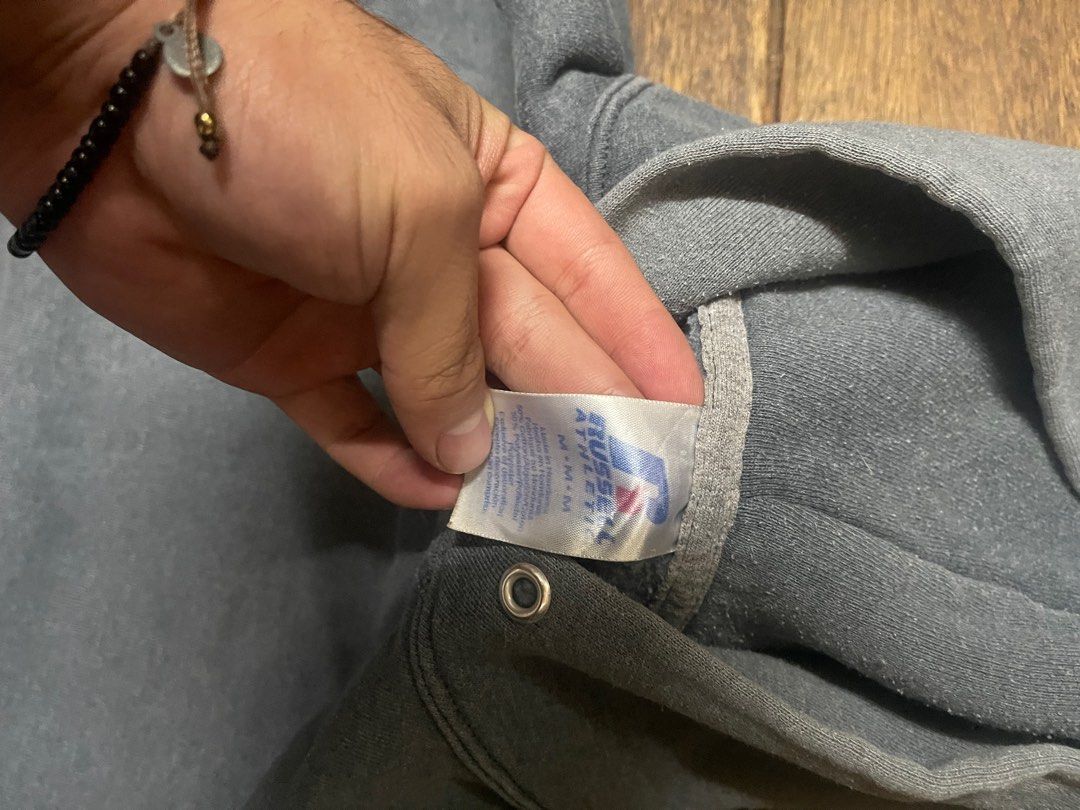 Russell Athletic Gray Hoodie (Category: Hoodies) located in Dumaguete. Submitted by markyooo (Listing ID 1404180018, Image 3). Description: - Russell Athletic hoodie - Size: M - Color: Gray - color rate 9/10 - slight fading on the hood .