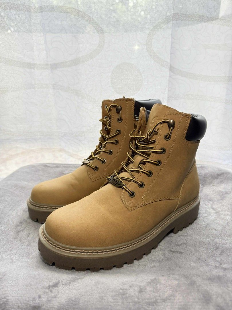 STWD Lace-up Boots (Category: Boots) located in Manila. Submitted by sparkplug2002 (Listing ID 1404255754, Image 1). Description: - STWD lace-up boots - Tan suede-like upper - Brown sole - Lace-up closure with metal eyelets - Padded collar - Chunky sole for grip and style - Brown heel cap lightly used shipping is paid by buyer LBC or J&t.