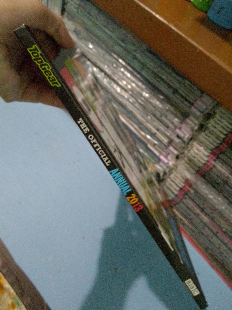 Top Gear Annual 2013 hardbound (Category: Magazines) located in Ligao. Submitted by zeeyans_nook (Listing ID 1404337396, Image 3). Description: - Top Gear Annual 2013 - Features content from the BBC show - Includes articles on: - Fastest cars - The Stig - More car-related topics - Contains illustrations and photographs - Great for Top Gear fans!.
