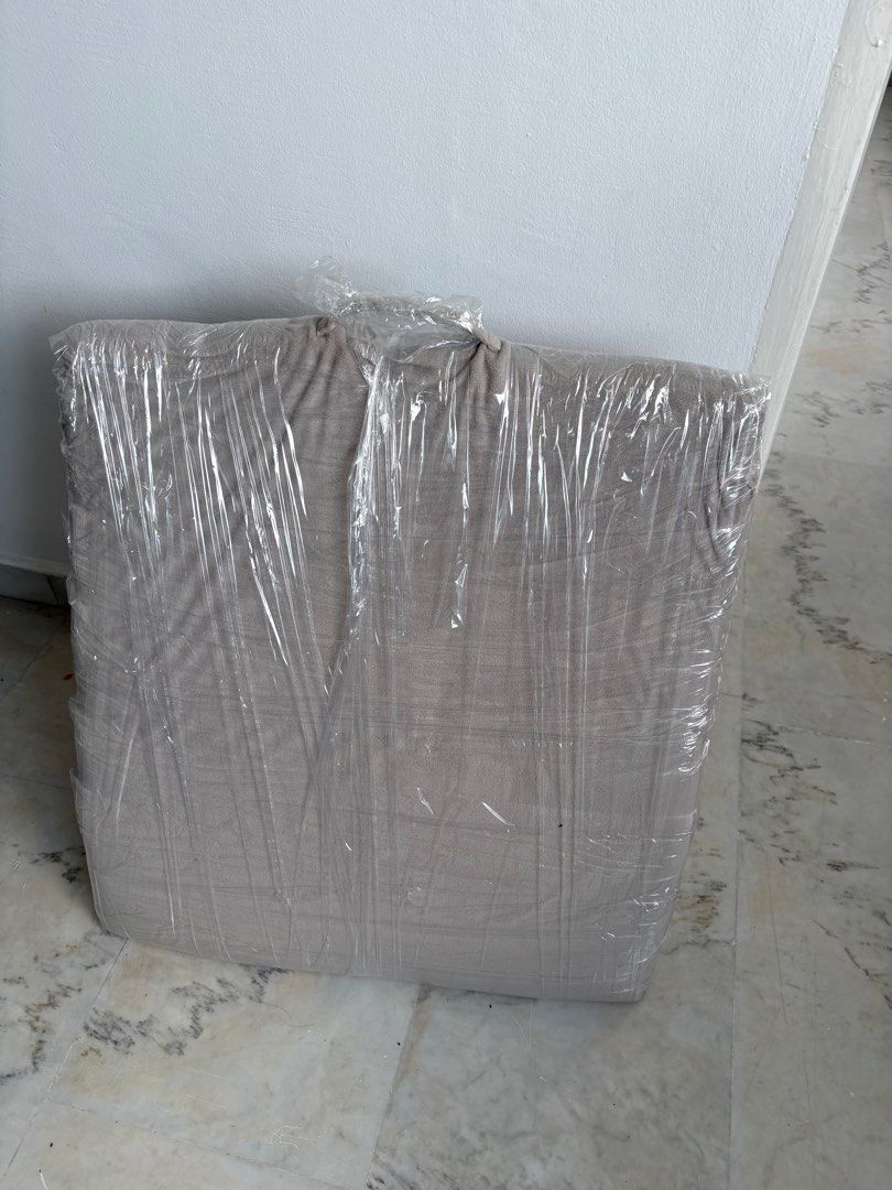 Triangular backrest (Category: Cushions & Throws) located in Singapore. Submitted by ajgnin (Listing ID 1404334988, Image 2). Description: Good for those who are bedridden, or even to use as an additional back support on sofa or bed. Have been cling wrapped for hygiene purposes. .