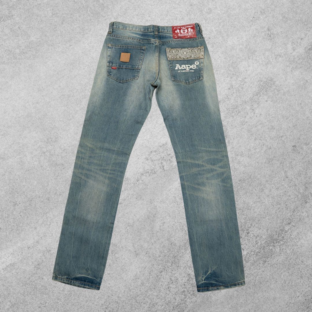 Vintage Aape denim pants (Category: Jeans) located in San Pedro. Submitted by thriftsouthfinds (Listing ID 1404336183, Image 2). Description: Length: 44 inches Width: 16 inches.