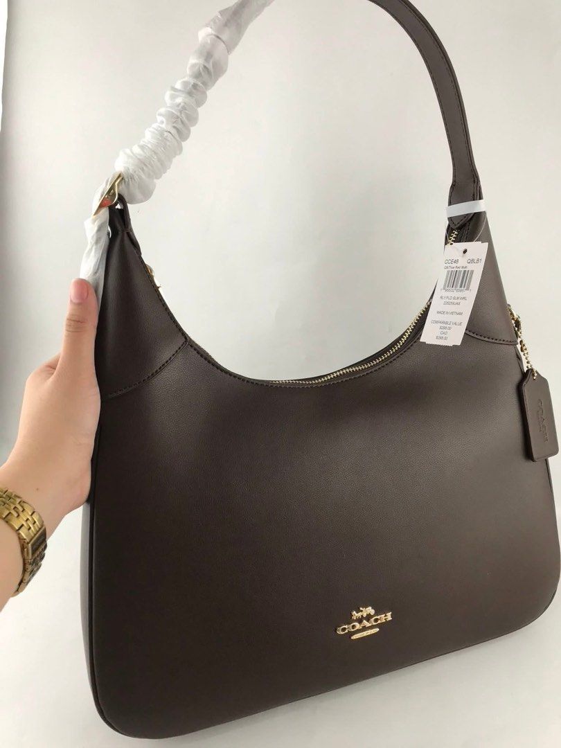 ☘️ CCH Ella Hobo Shoulder Bag (Category: Luxury Bags & Wallets) located in Manila. Submitted by vera.prudence (Listing ID 1404522422, Image 2). Description: ☘️ CCH Ella Hobo Shoulder Bag L: 14.0" H: 12.75" W: 2.5" P2,300 Actual Photo Plus SF.