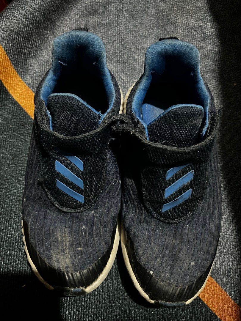 Adidas Alphabounce Kids Shoes (Category: Babies & Kids Fashion) located in Marikina City. Submitted by nikki881 (Listing ID 1404567741, Image 1). Description: - Adidas Alphabounce kids shoes - Color: Navy blue - Design: Slip-on with velcro strap - Features Adidas logo on heel - Adidas three stripes detail - White soles.