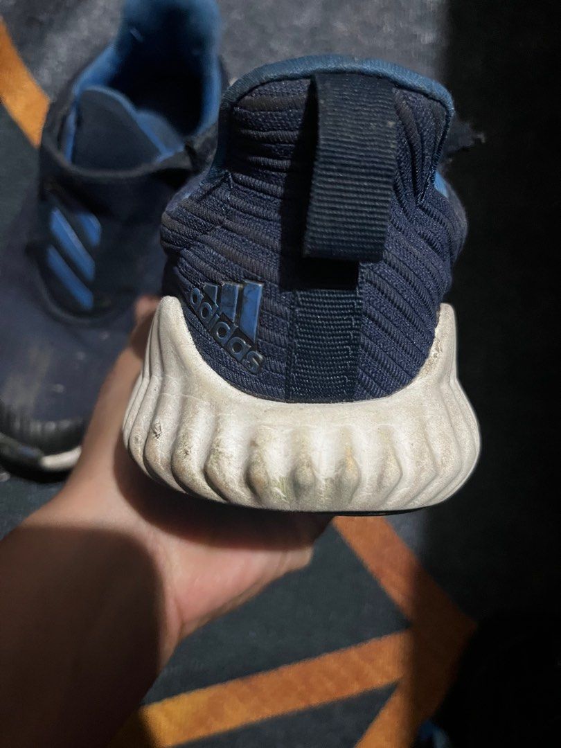 Adidas Alphabounce Kids Shoes (Category: Babies & Kids Fashion) located in Marikina City. Submitted by nikki881 (Listing ID 1404567741, Image 2). Description: - Adidas Alphabounce kids shoes - Color: Navy blue - Design: Slip-on with velcro strap - Features Adidas logo on heel - Adidas three stripes detail - White soles.