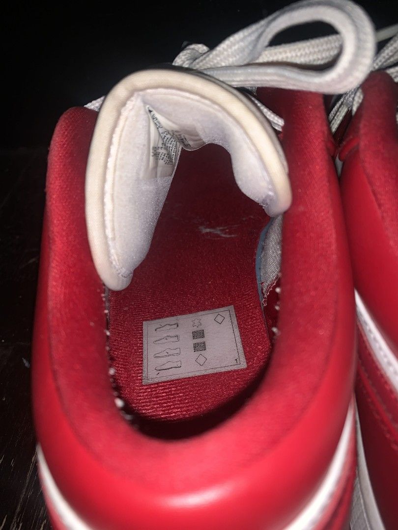 Air Jordan 1 Low - Red and White (Category: Sneakers) located in Pasay City. Submitted by bettergrey (Listing ID 1404471952, Image 3). Description: - Air Jordan 1 Low - Color: Red and White - Size: US 10 - Features Nike swoosh and Jumpman logo - White laces and soles - Red interior - Air Jordan logo on the back - Number 23 on the tongue.