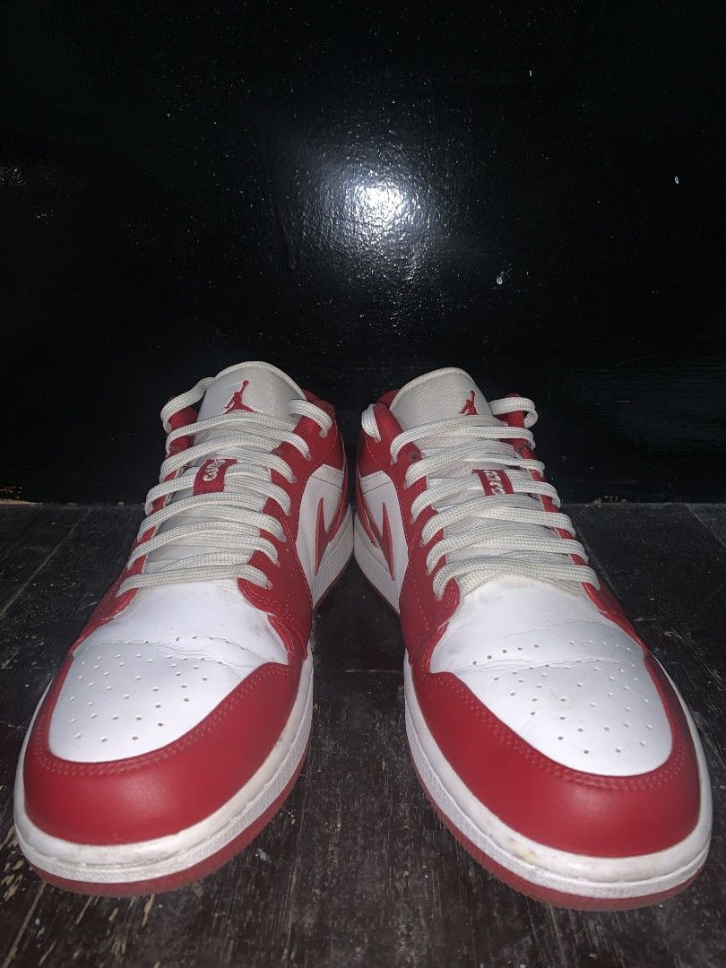 Air Jordan 1 Low - Red and White (Category: Sneakers) located in Pasay City. Submitted by bettergrey (Listing ID 1404471952, Image 1). Description: - Air Jordan 1 Low - Color: Red and White - Size: US 10 - Features Nike swoosh and Jumpman logo - White laces and soles - Red interior - Air Jordan logo on the back - Number 23 on the tongue.