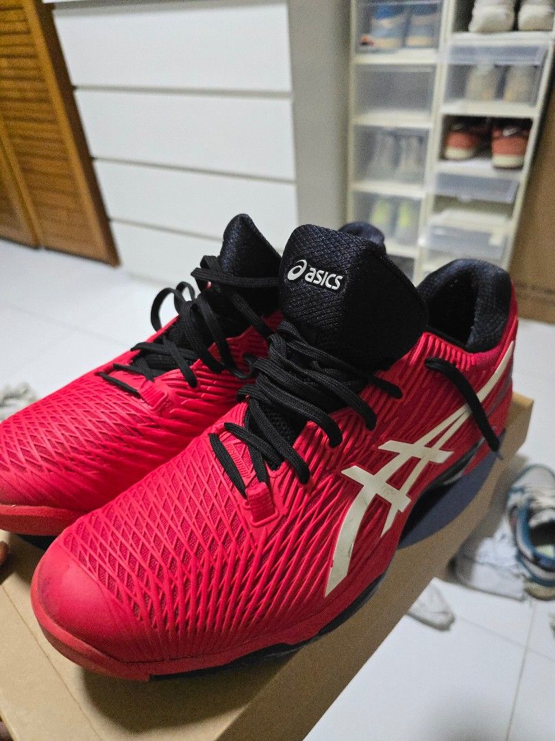 Asics Solution Speed FF 2 - Red US12 (Category: Sneakers) located in Singapore. Submitted by xtempestx (Listing ID 1404504499, Image 1). Description: - Asics Solution Speed FF 2 tennis shoes - Bright red color -US12 - barely used, too narrow for me - Asics logo on side and tongue.