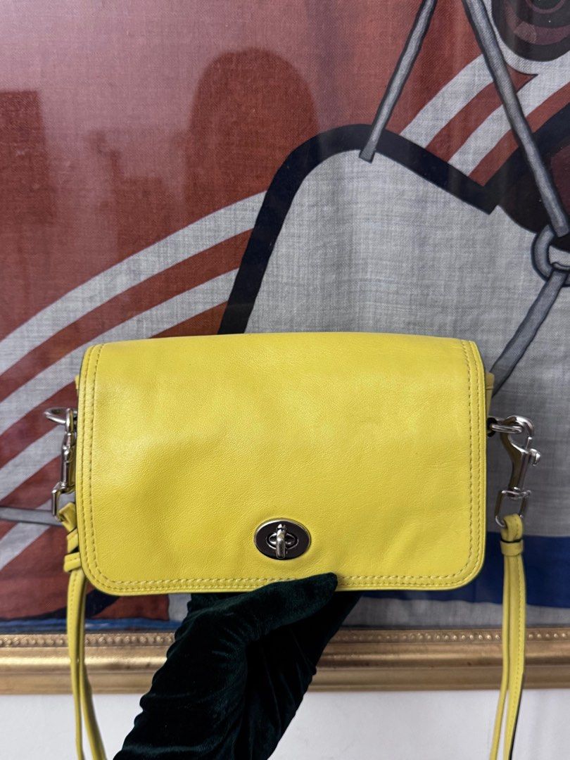 Authentic coach yellow penny sling bag (Category: Luxury Bags & Wallets) located in Rizal. Submitted by houseofbell (Listing ID 1404473786, Image 3). Description: Excellent condition Likenew Genuine leather material 💯 authentic .