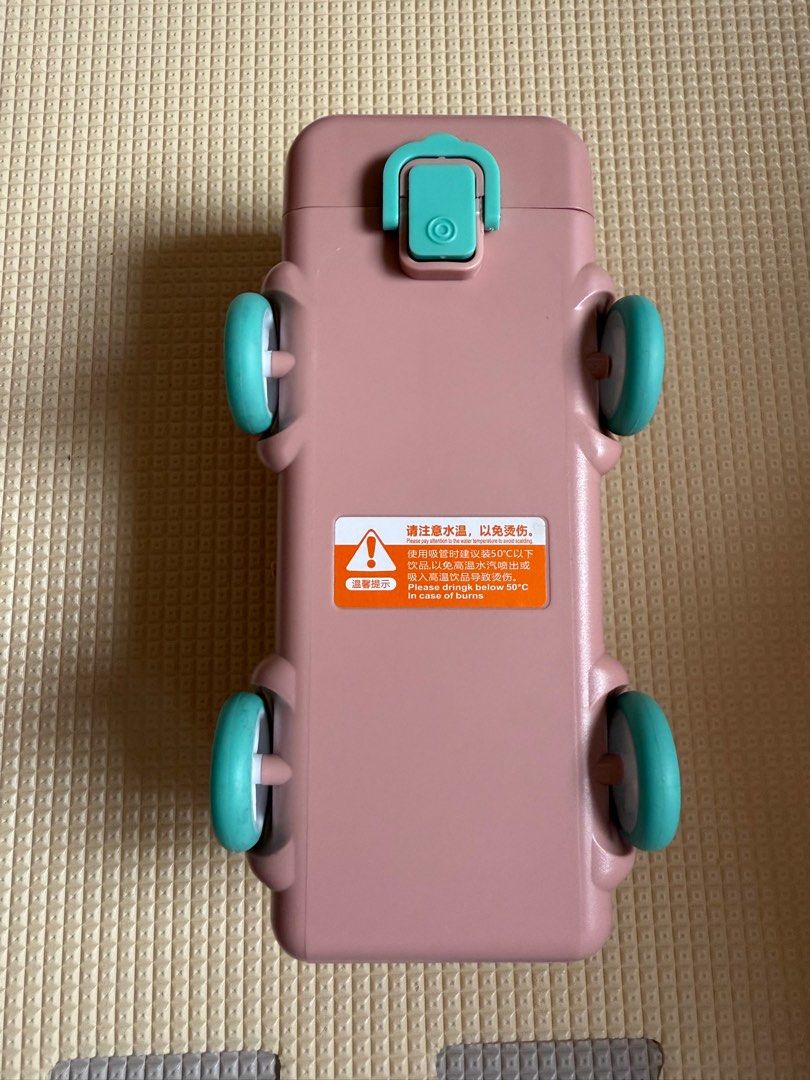 Bus-Shaped Water Bottle with Strap (Category: Water Bottles & Tumblers) located in Manila. Submitted by bearswardrobe (Listing ID 1404415973, Image 3). Description: 500 ml kid water bottle with strap. Color: Pink.