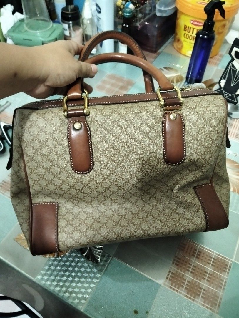 Celine Macadam Handbag (Category: Luxury Bags & Wallets) located in Manila. Submitted by beabi041582 (Listing ID 1404497010, Image 3). Description: dimension 11.5 xl 9, with flaw sa baba ng handles , vintage Pero ok pa yung bag leather may flaw sa handle Pero magagamit patahin mo na lang original to Classic Celine handbag featuring the iconic Macadam pattern. It has brown leather accents on the handles, corners, and trim. The bag has a top zipper