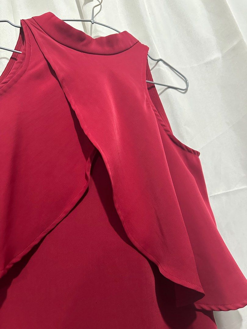 CLN Red Cocktail Dress (Category: Dresses) located in Quezon City. Submitted by jadeeclutterz (Listing ID 1404492848, Image 2). Description: Elegant red cocktail dress from CLN. Features a unique layered design with a high neckline, halter, and open shoulders. The dress has a keyhole back detail. Perfect for special occasions or a night out. See delivery details below.