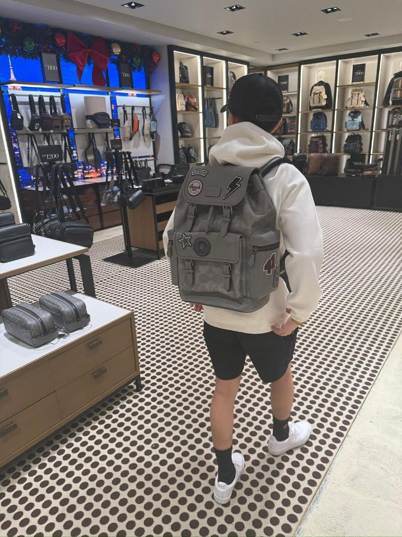 Coach Patchwork Backpack - Grey (Category: Backpacks) located in Singapore. Submitted by joyladder21 (Listing ID 1404381871, Image 6). Description: Stylish Coach backpack in grey with patchwork details. Features multiple compartments and adjustable straps. Perfect for everyday use or travel. Excellent condition, as shown in the photos. Purchased from a Coach outlet. used once like brandnew..