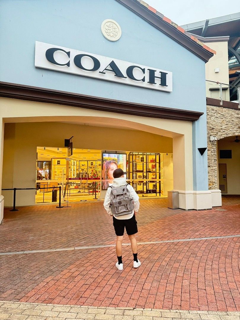 Coach Patchwork Backpack - Grey (Category: Backpacks) located in Singapore. Submitted by joyladder21 (Listing ID 1404381871, Image 5). Description: Stylish Coach backpack in grey with patchwork details. Features multiple compartments and adjustable straps. Perfect for everyday use or travel. Excellent condition, as shown in the photos. Purchased from a Coach outlet. used once like brandnew..