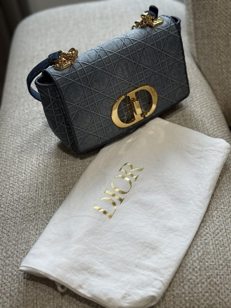 Dior Lady D-Joy Denim Bag (Category: Luxury Bags & Wallets) located in Quezon City. Submitted by cierre.closet (Listing ID 1404445307, Image 1). Description: - Includes dust bag - Flap closure - Gold-tone hardware.