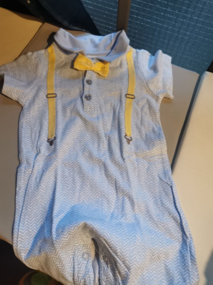 First Impressions Baby Romper with Bowtie (Category: Babies & Kids Fashion) located in Quezon City. Submitted by declutteringmami (Listing ID 1404572654, Image 2). Description: - Adorable baby romper - Light blue and white chevron pattern - Includes a yellow bowtie and suspenders - Collared neckline and button-down front - Size: 12 months.