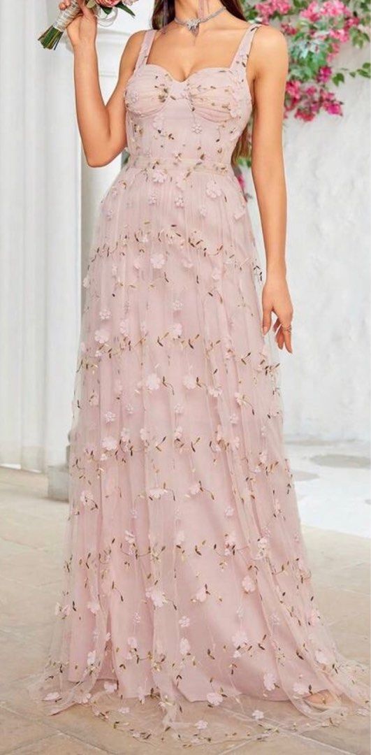 Floral Embroidered Maxi Dress (Category: Dresses) located in Las Pinas. Submitted by ssuarez0 (Listing ID 1404472944, Image 2). Description: - Soft pink maxi dress - Delicate floral embroidery - Sweetheart neckline - Spaghetti straps - Floor-length, flowing skirt - Fitted bodice, A-line silhouette - Padded - Ideal for special events - Used once - Bust: 35in - Waist: 28in .