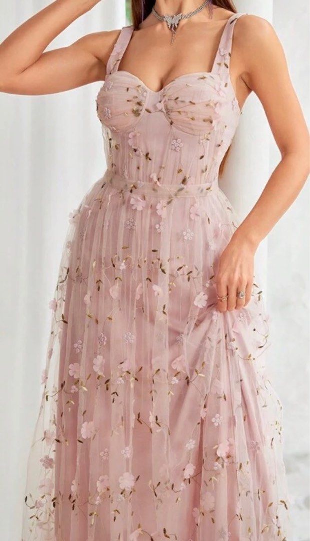 Floral Embroidered Maxi Dress (Category: Dresses) located in Las Pinas. Submitted by ssuarez0 (Listing ID 1404472944, Image 1). Description: - Soft pink maxi dress - Delicate floral embroidery - Sweetheart neckline - Spaghetti straps - Floor-length, flowing skirt - Fitted bodice, A-line silhouette - Padded - Ideal for special events - Used once - Bust: 35in - Waist: 28in .