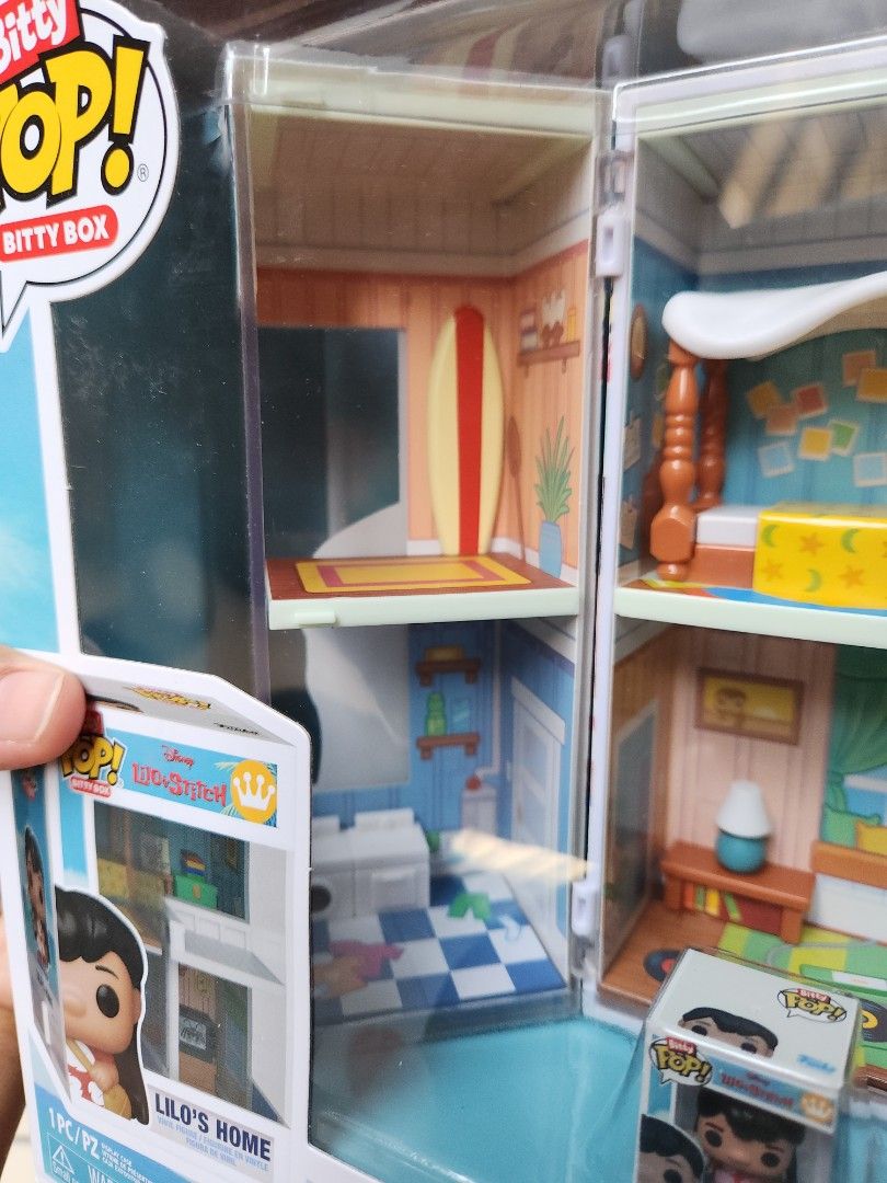 Funko Pop! Disney Lilo's Home Bitty Box (Category: Designer & Blind Box Toys) located in Aurora. Submitted by mothere (Listing ID 1404572493, Image 2). Description: - Funko Pop! Bitty Box: Lilo's Home from Lilo & Stitch - Includes mini figures of Lilo and Stitch - Features detailed interior design of Lilo's house - Perfect collectible for Disney fans!.