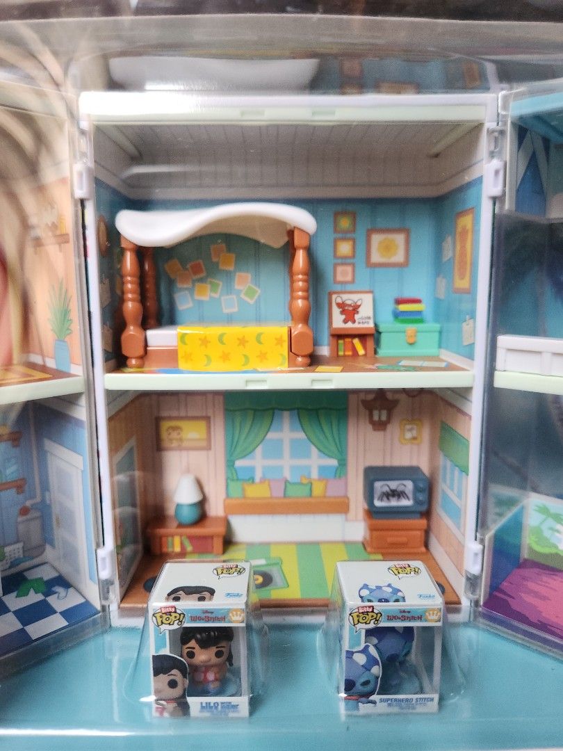 Funko Pop! Disney Lilo's Home Bitty Box (Category: Designer & Blind Box Toys) located in Aurora. Submitted by mothere (Listing ID 1404572493, Image 3). Description: - Funko Pop! Bitty Box: Lilo's Home from Lilo & Stitch - Includes mini figures of Lilo and Stitch - Features detailed interior design of Lilo's house - Perfect collectible for Disney fans!.