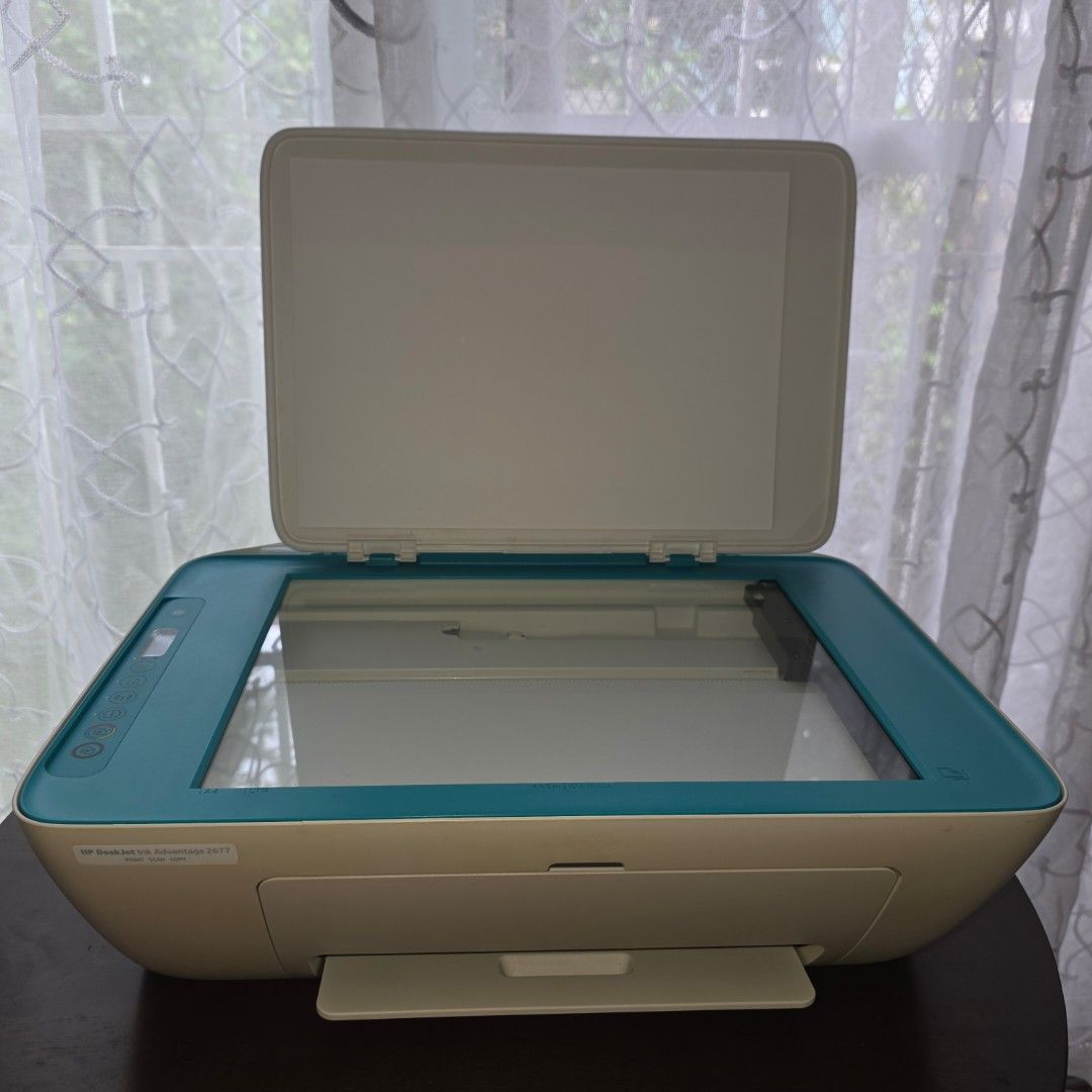 [WITH ISSUE] HP DESKJET INK ADVANTAGE 2677 Printer (Category: Printers, Scanners & Copiers) located in Bacoor. Submitted by xil10 (Listing ID 1404539587, Image 1). Description: HP DESKJET INK ADVANTAGE 2677 Print scan copy Cartridge code 680 blk/colored Color: White-blue Year: 2017-2018 Selling Php 500, no ink installed Scanner working. ISSUE: printing but feeder with issue. print output with lines. payment mode: bank transfer, gcash delivery: sh