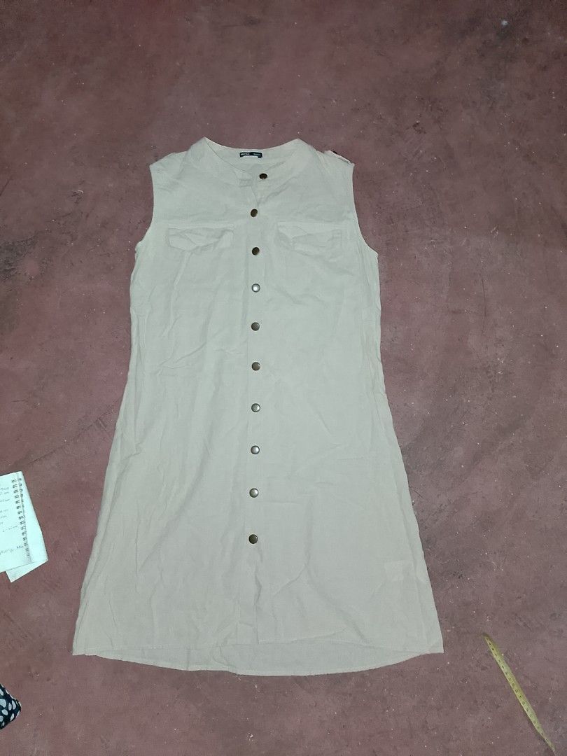 HSTYLE Sleeveless Dress (Category: Dresses) located in Marikina City. Submitted by lemonpreluvs (Listing ID 1404503953, Image 1). Description: - HSTYLE Sleeveless Dress - Light beige color - Size M (165/84A) - Features: - Button-down front - Two chest pockets - Material: - Upper part: 100% Cotton - Lower part: 100% Polyester Fiber GCash payment only and shipping through jnt.