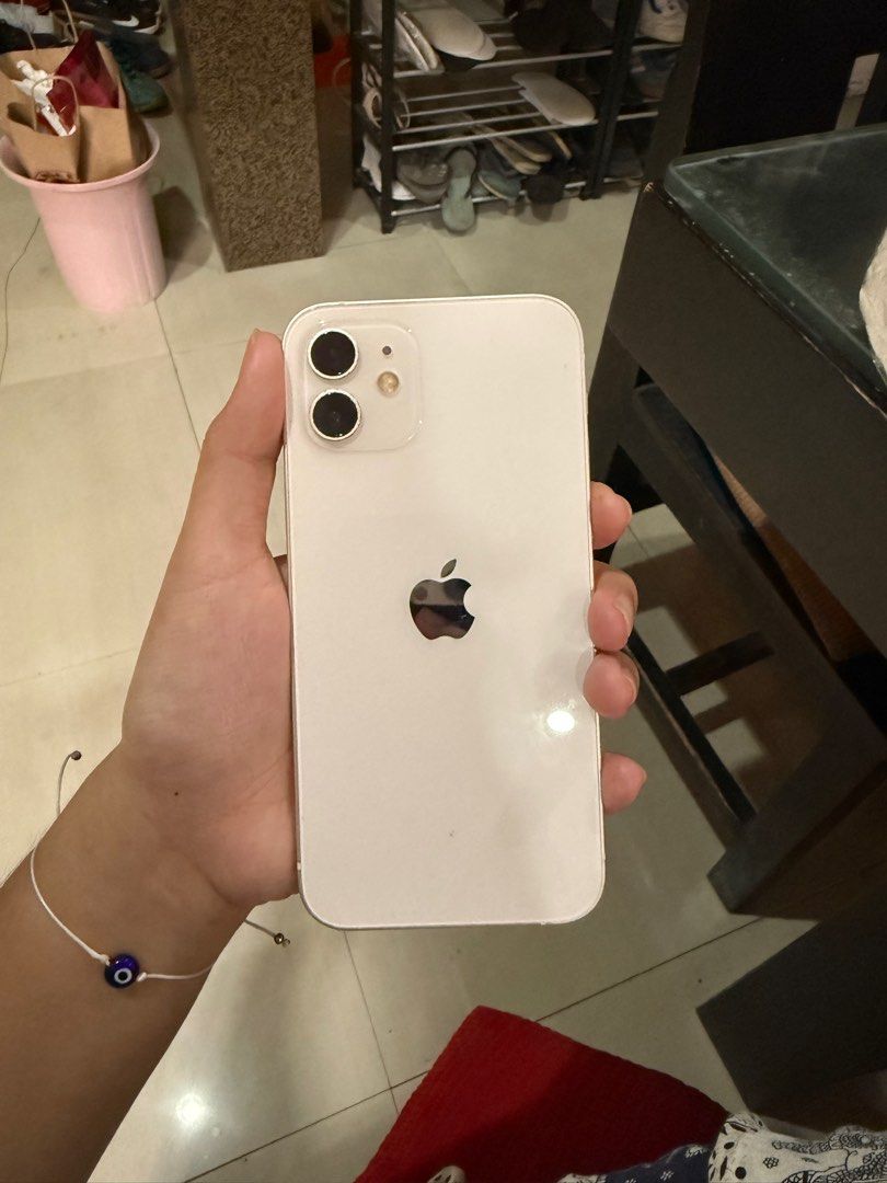 iPhone 12 (Category: iPhone 12 Series) located in San Pedro. Submitted by .mari. (Listing ID 1404411331, Image 1). Description: - First owner - lady owned - with original box but no charger Battery life: 71% rfs: upgraded already .