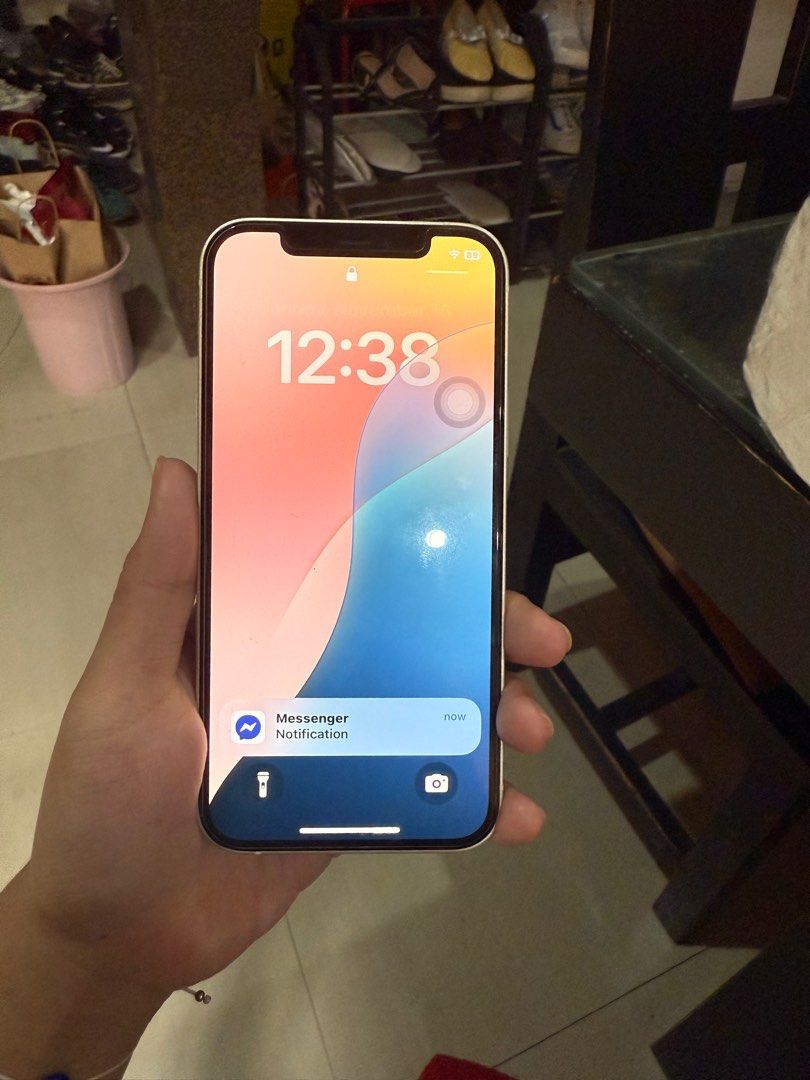 iPhone 12 (Category: iPhone 12 Series) located in San Pedro. Submitted by .mari. (Listing ID 1404411331, Image 2). Description: - First owner - lady owned - with original box but no charger Battery life: 71% rfs: upgraded already .