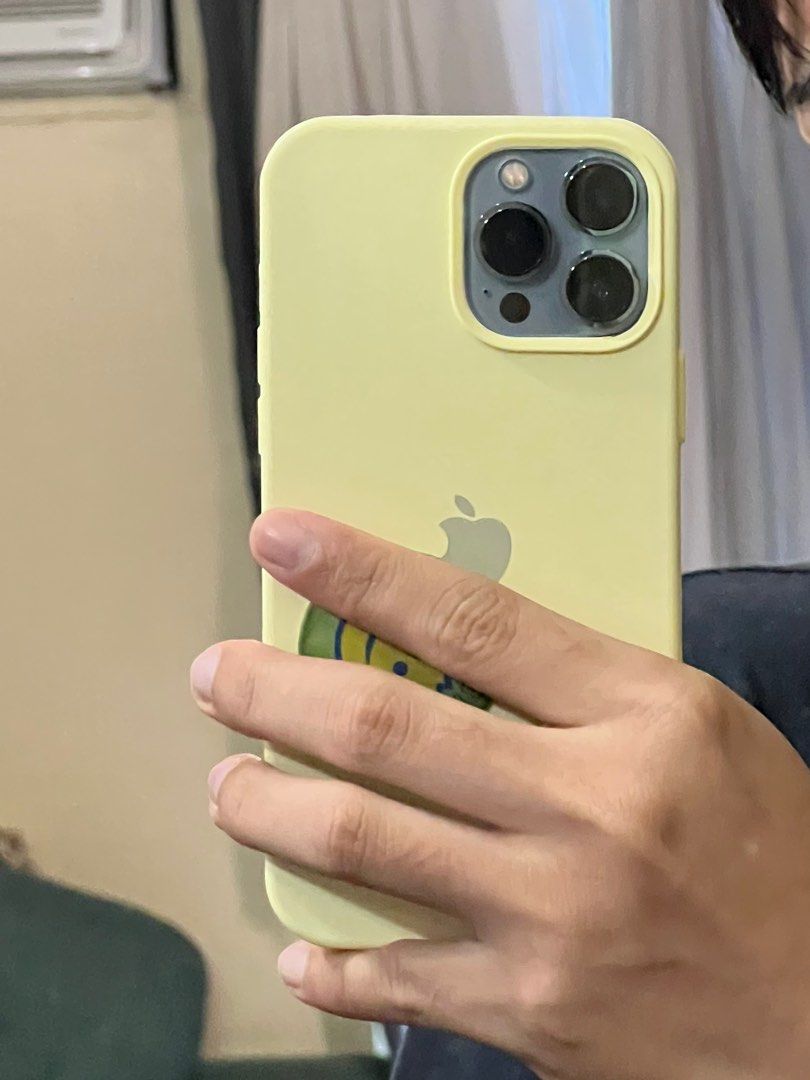 iPhone 13 Pro Max Silicone Case (Category: Cases & Sleeves) located in Makati City. Submitted by i_declutter.mnl (Listing ID 1404401825, Image 3). Description: for iPhone 13 Pro Max available colors: black & milky yellow.