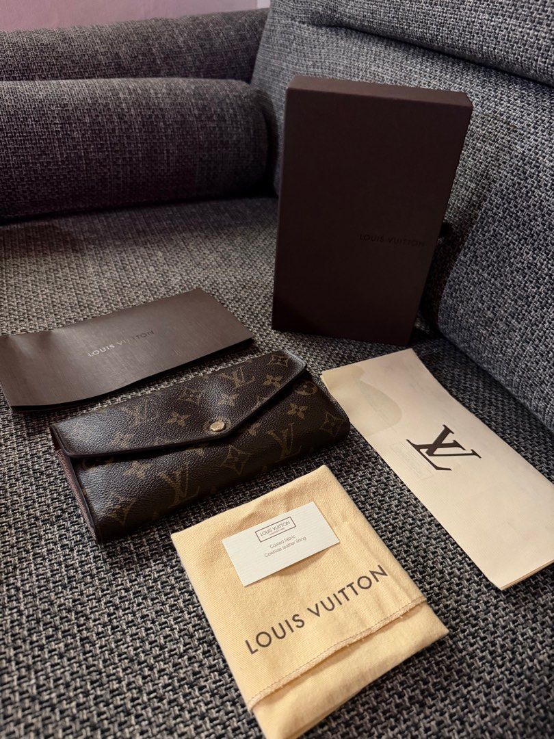 Louis Vuitton Sarah Wallet Monogram - 18 card slots (Category: Luxury Bags & Wallets) located in Manila. Submitted by maiserdaz (Listing ID 1404544489, Image 2). Description: PLEASE READ BEFORE SENDING OFFER -No lowballer. Price posted is already low. -24hours reservation only. -Please no joy reserver. - Authentic Louis Vuitton Sarah Wallet - Monogram canvas - Snap closure - Multiple card slots - Zippered coin pocket - Bill compartments - Include